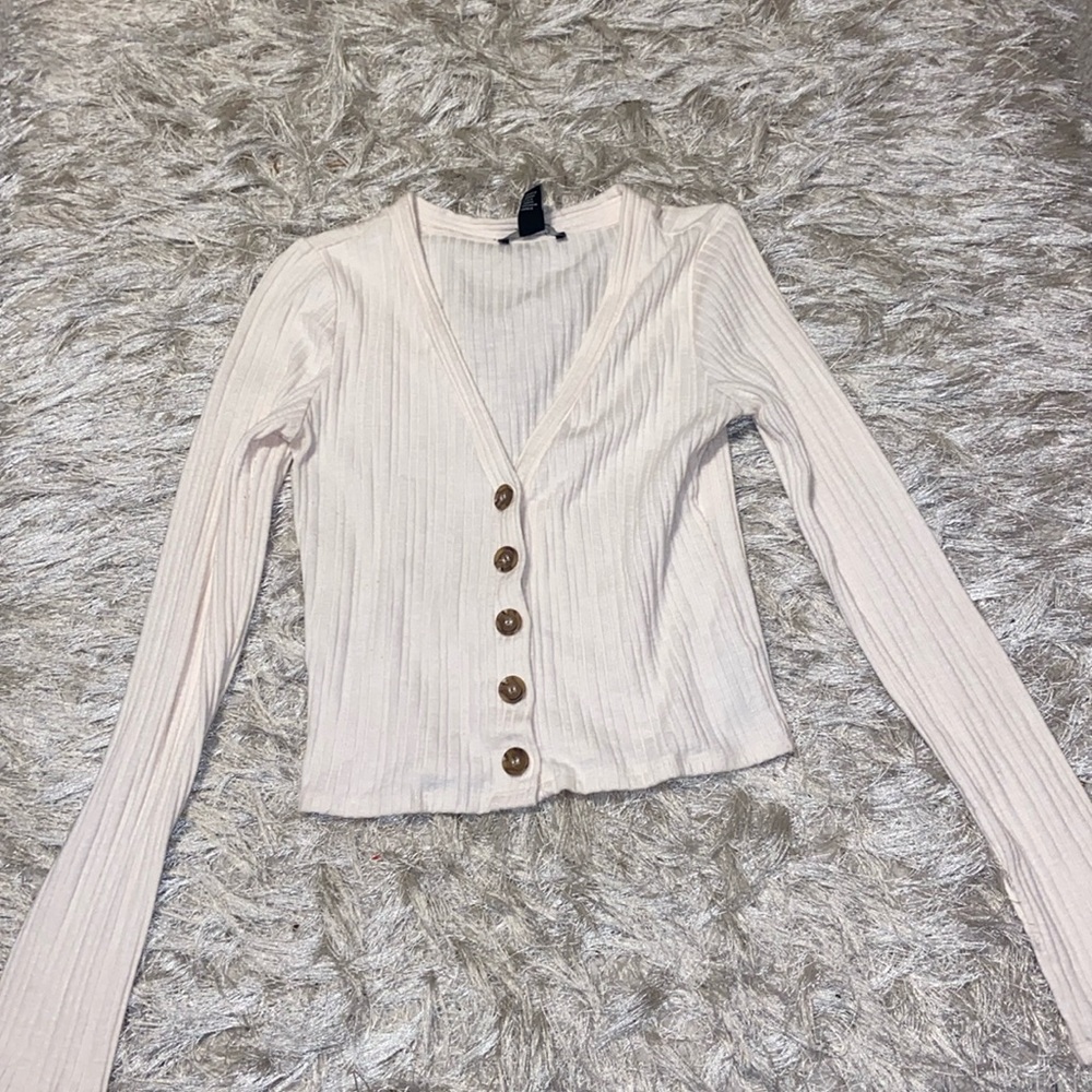 Large forever 21 cropped button up shirt slight light pink tone to color